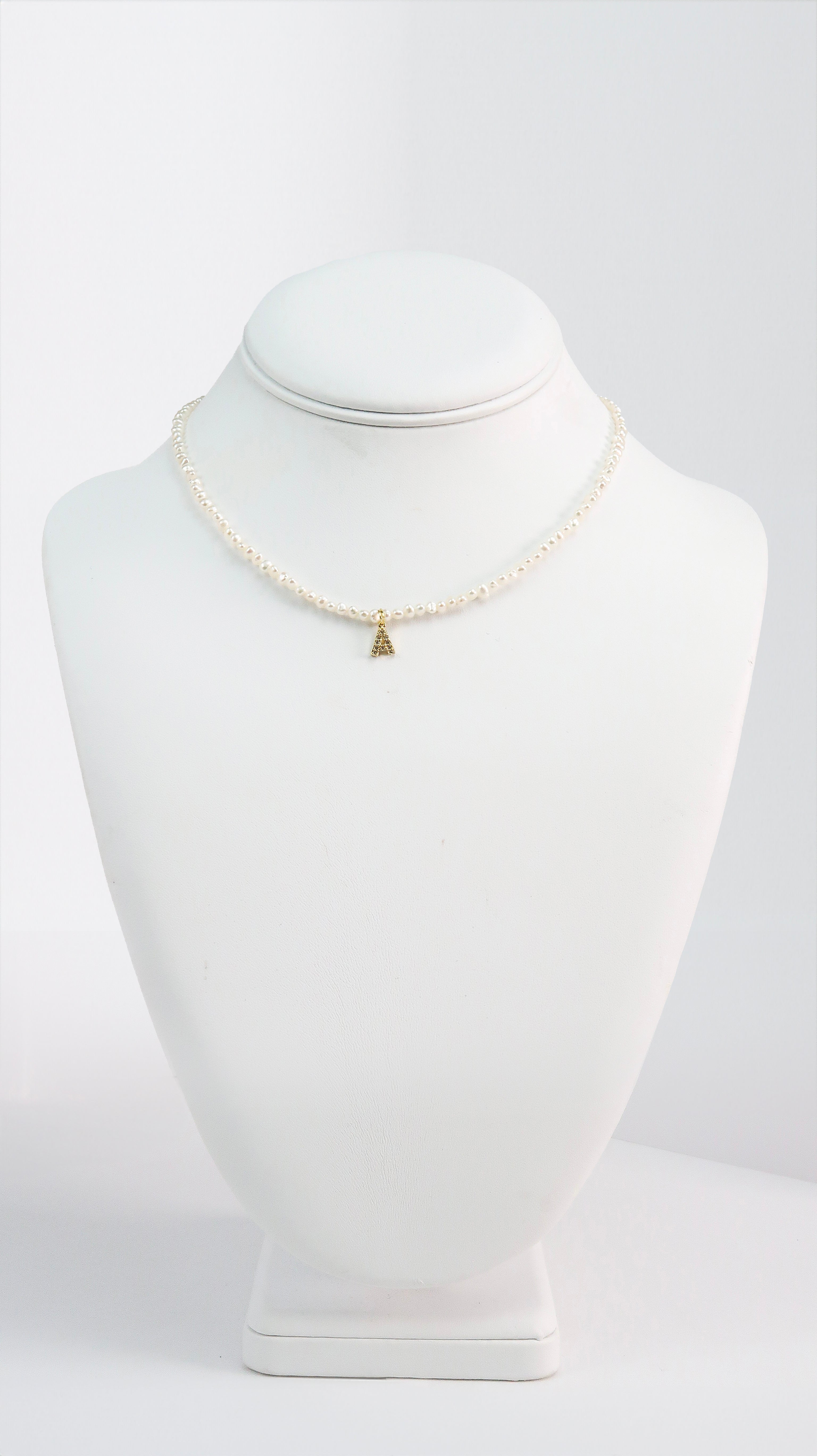 A Necklace with Cubic letter