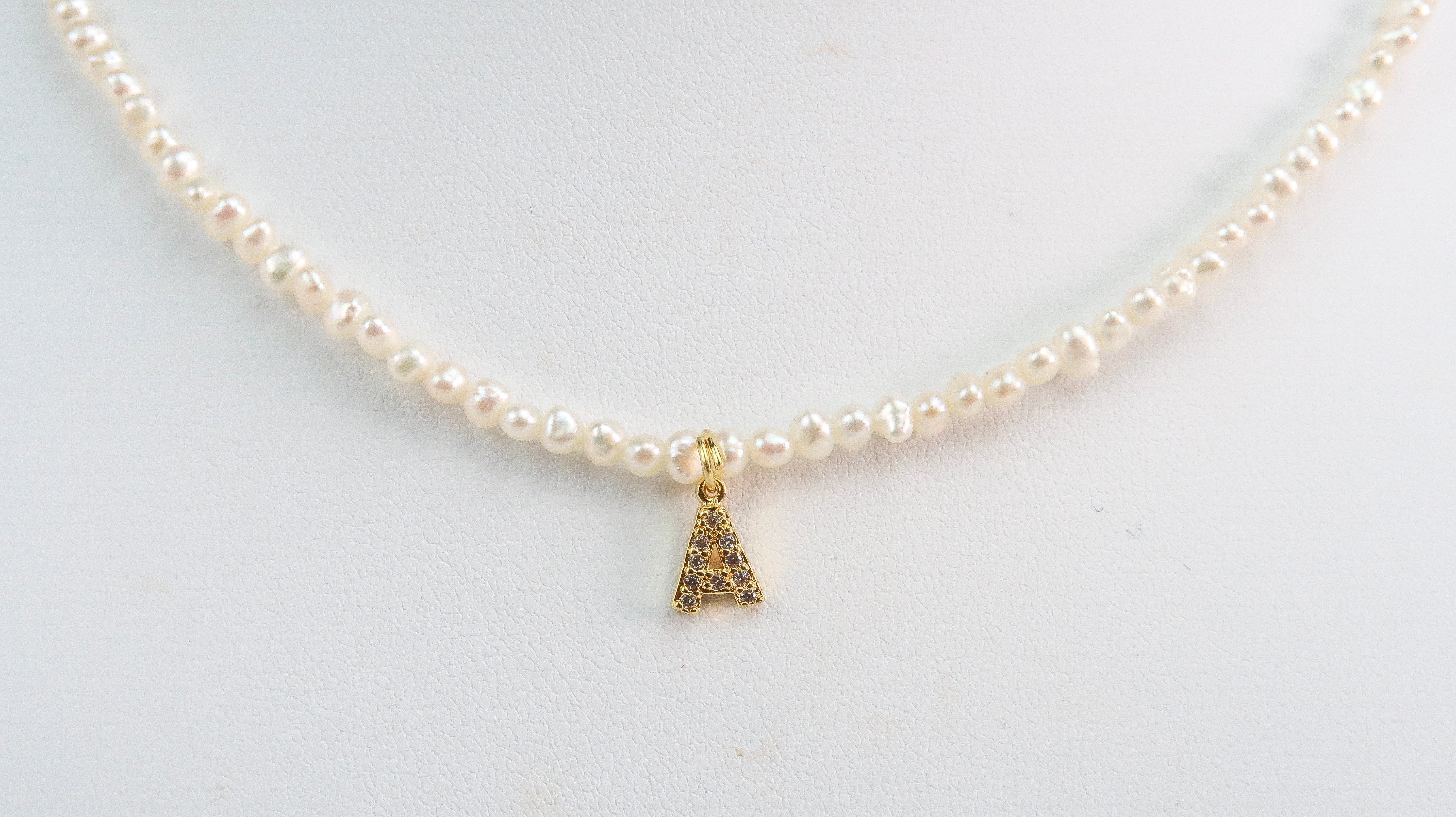 A Necklace with Cubic letter