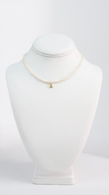 A Necklace with Gold Plated letter